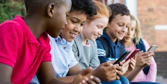 kids watching in mobile phone