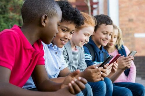 kids watching in mobile phone